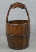 A 20th century Chinese hardwood, possibly Firwood coppered basket with carrying handle, complete