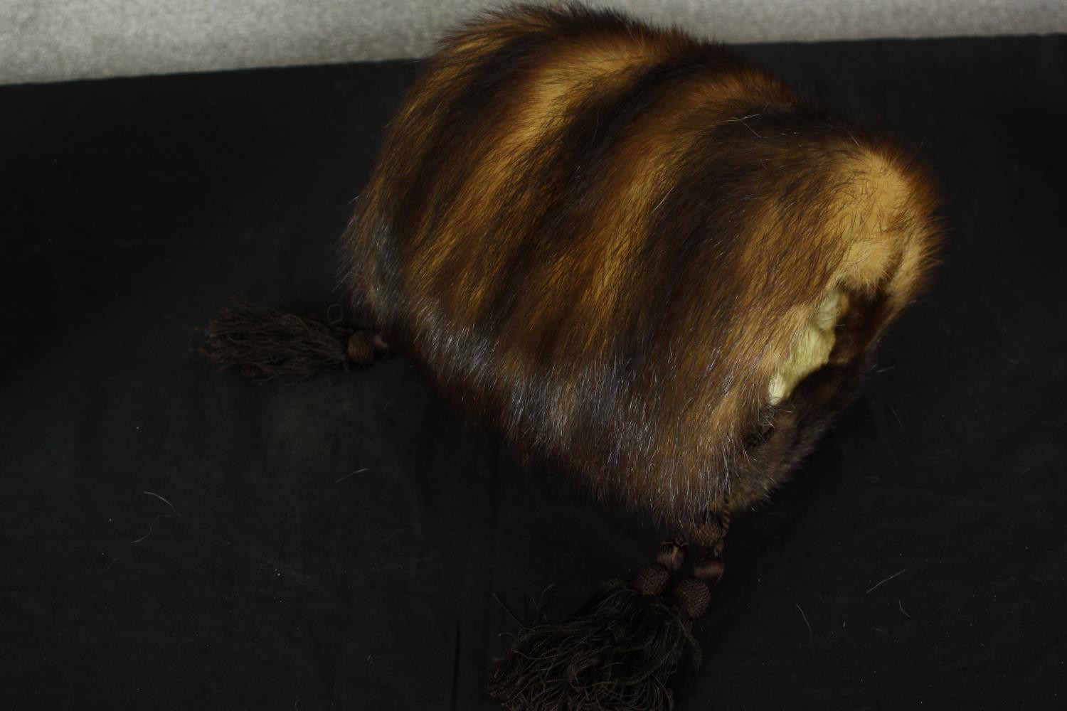 An early 20th century John Barker and Co boxed and packaged mink fur hand muff with silk tassel - Image 3 of 5