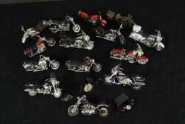 A collection of fourteen unboxed scale model Harley Davidson motorbikes. H.8 W.13 D.3cm. (largest)