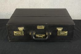 A contemporary gentlemen's black leather briefcase. H.34 W.46 D.15cm.