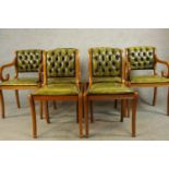 A set of six Yew wood Regency style button/quilted backed dining chairs comprised of four singles