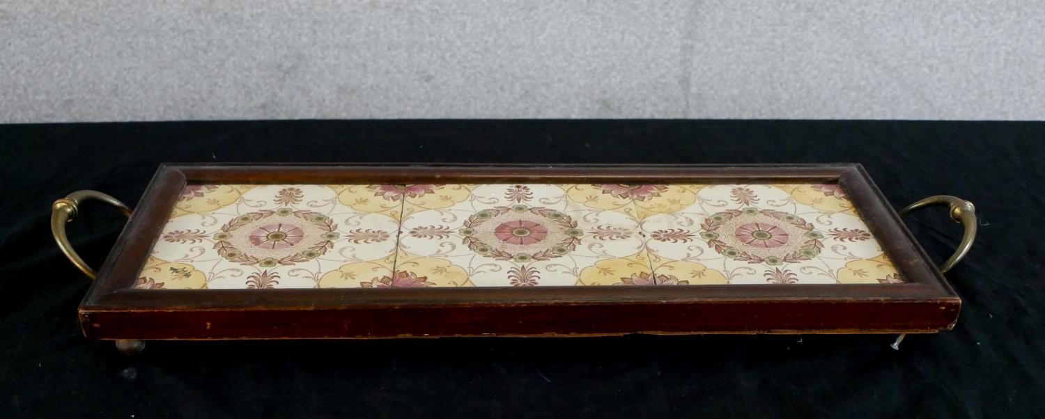 A late 19th century mahogany and brass twin handled tray, inset with three floral decorated square - Image 5 of 6