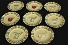 A set of eight Gucci Greek Mythology pattern porcelain plates, marked 'GUCCI' to the underside.
