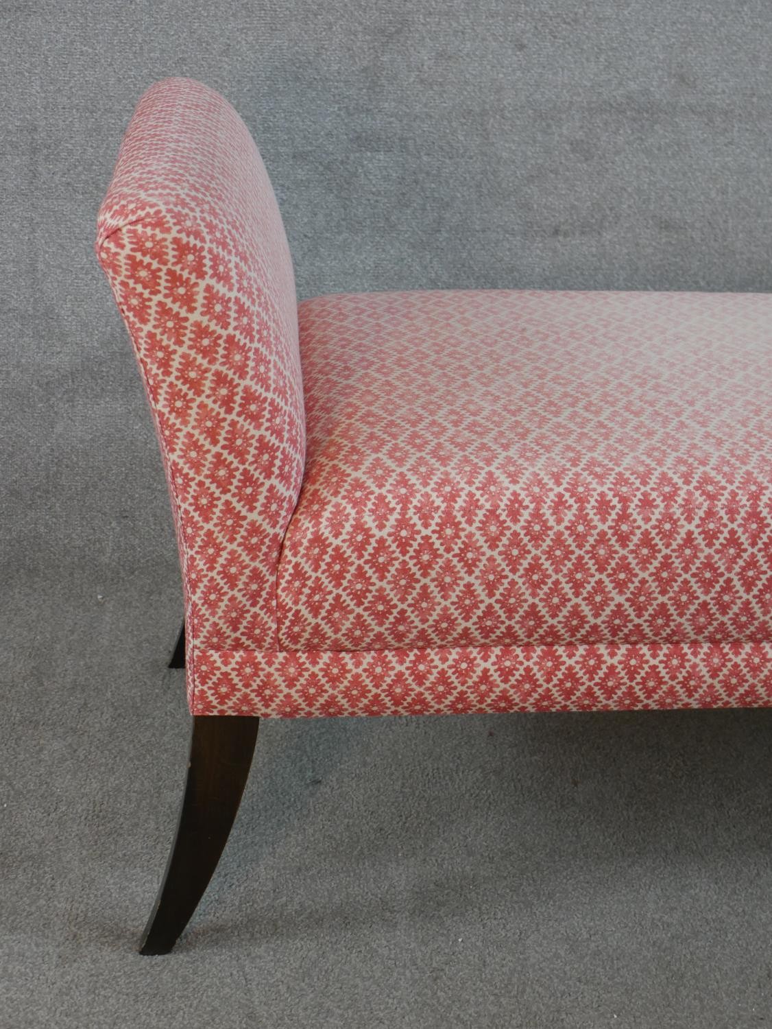 A contemporary mahogany framed long stool upholstered in pink and white fabric, raised on tapering - Image 4 of 5