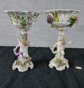 A pair 20th Schierholz Porzellanmanufaktur (German porcelain) floral encrusted tazzas, each with