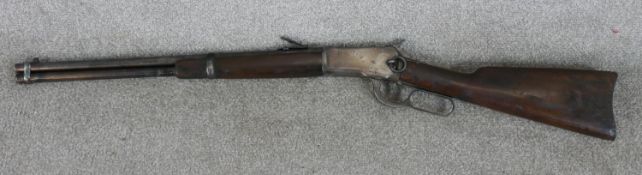 A deactivated Winchester 1892 lever action 20 inch barrel Saddle carbine /rifle and bearing