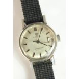 A vintage ladies Omega Ladymatic wristwatch, with baton numerals, sweeping second hand and date