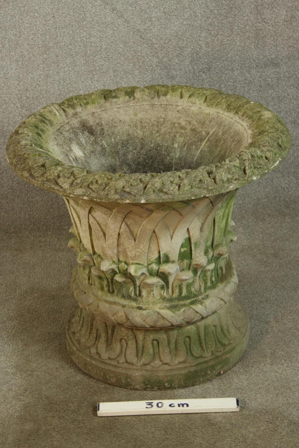 A 20th century stone garden urn shaped planter and stand, with blind lattice work decoration. H.56 - Image 2 of 6