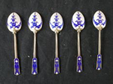 A set of five silver and guilloche blue and white enamel stylised hair bell and foliate design