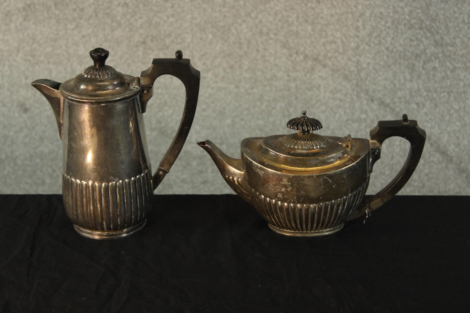 Two 20th century Harrods silver plated fluted coffee potand teapot, each marked to base and with