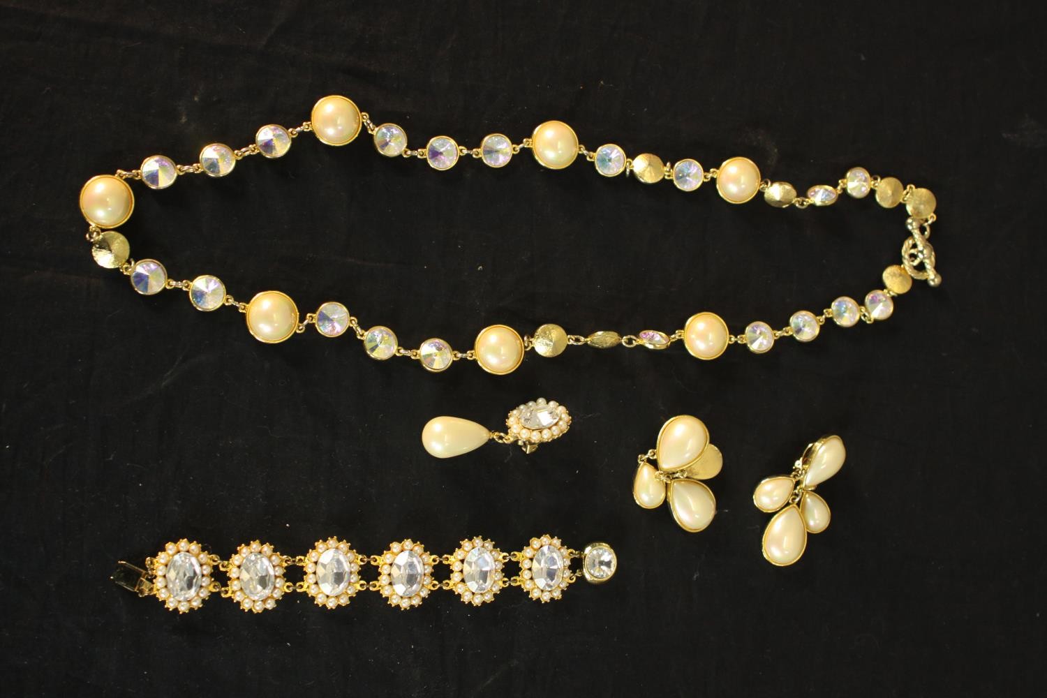 A collection of Swarovski and faux pearl costume jewellery, including a Sarah Booth crystal set oval