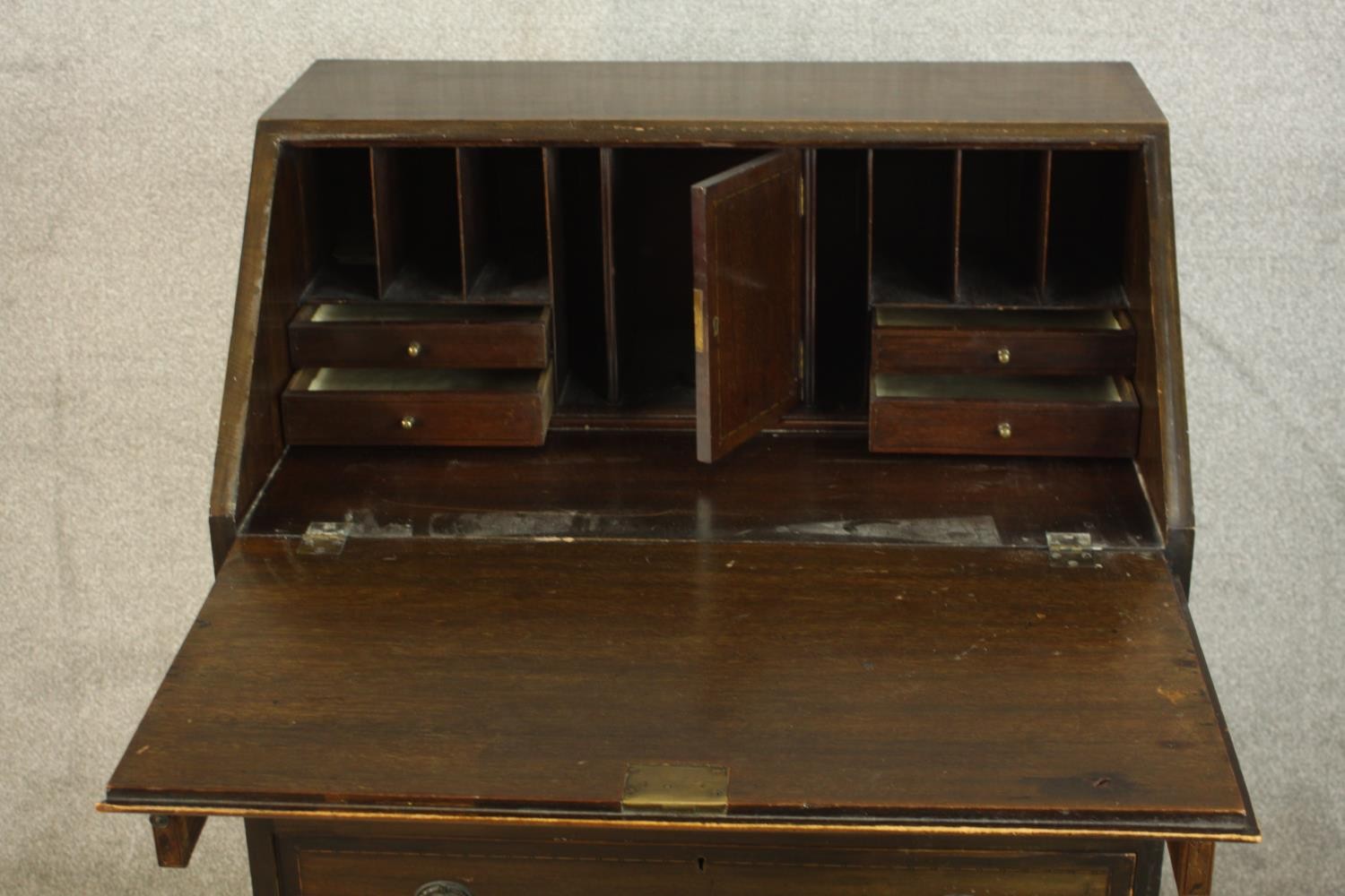 An early 20th century stained mahogany bureau, the fall front opening to reveal fitted interior, - Image 6 of 10