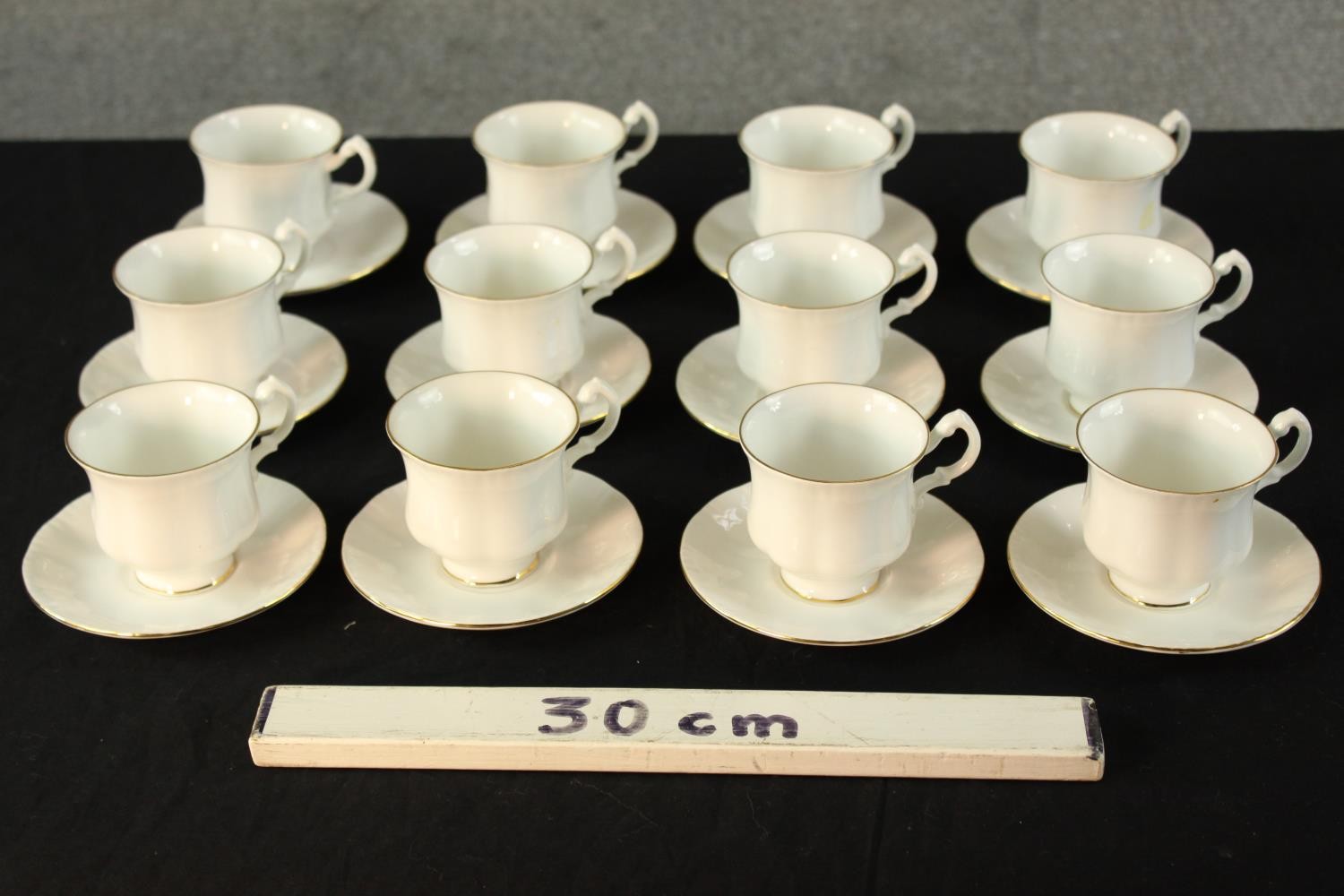 Twelve 20th century Royal Standard white painted porcelain cups and saucers, each with gold - Image 2 of 6