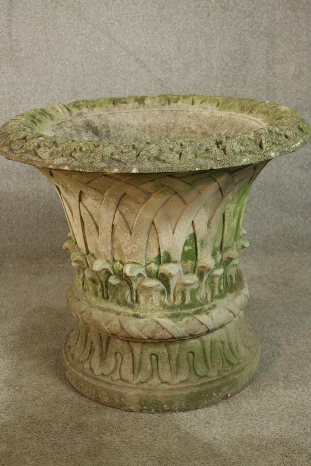 A 20th century stone garden urn shaped planter and stand, with blind lattice work decoration. H.56 - Image 4 of 6