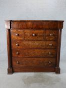 A 19th century flame mahogany Scotch style chest of three over three graduating drawers with