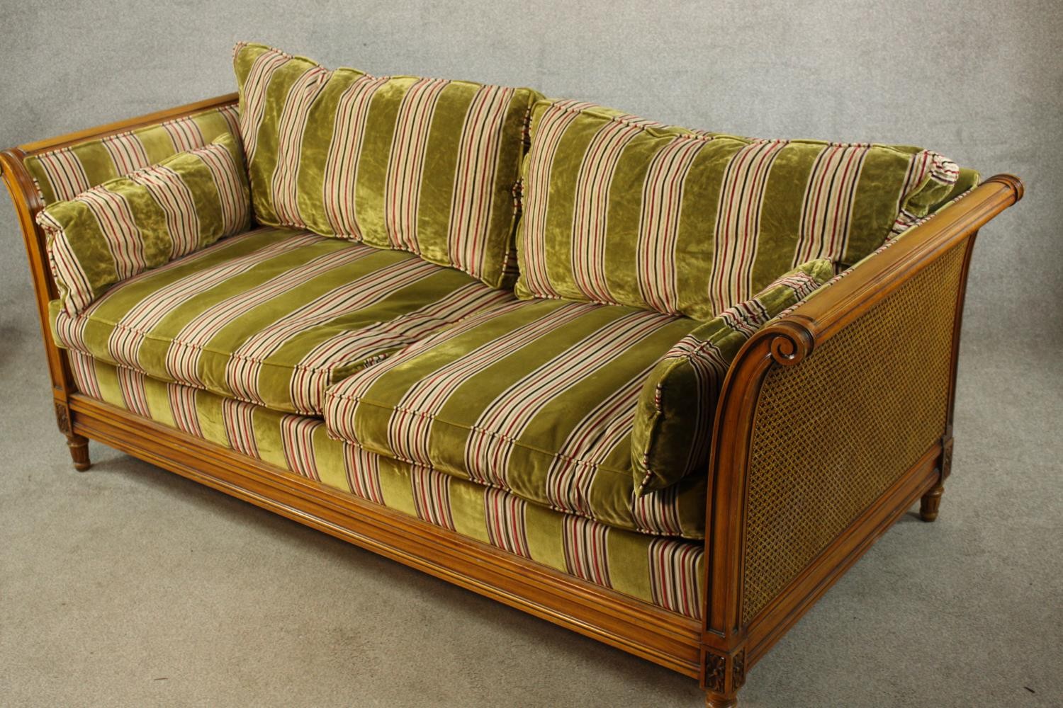 An early 20th century bergère and beech scroll arm two seater settee raised on fluted tapering - Image 8 of 8