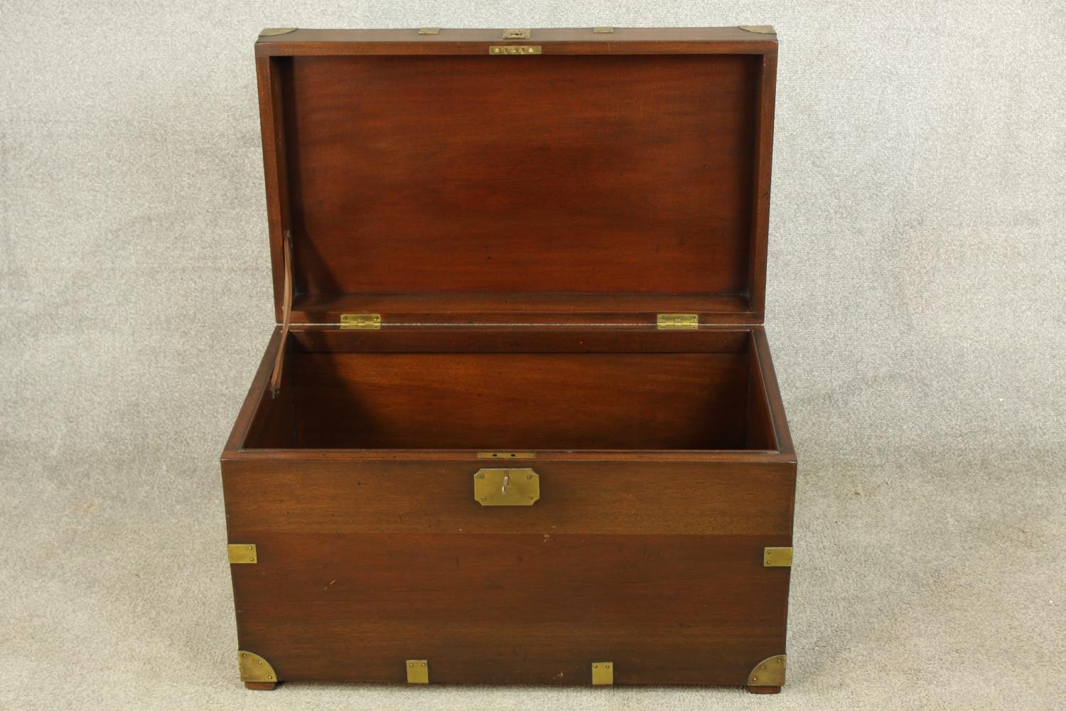 A 20th century stained hardwood and brass mounted campaign style twin handled blanket box. H.46 W.76 - Image 3 of 9