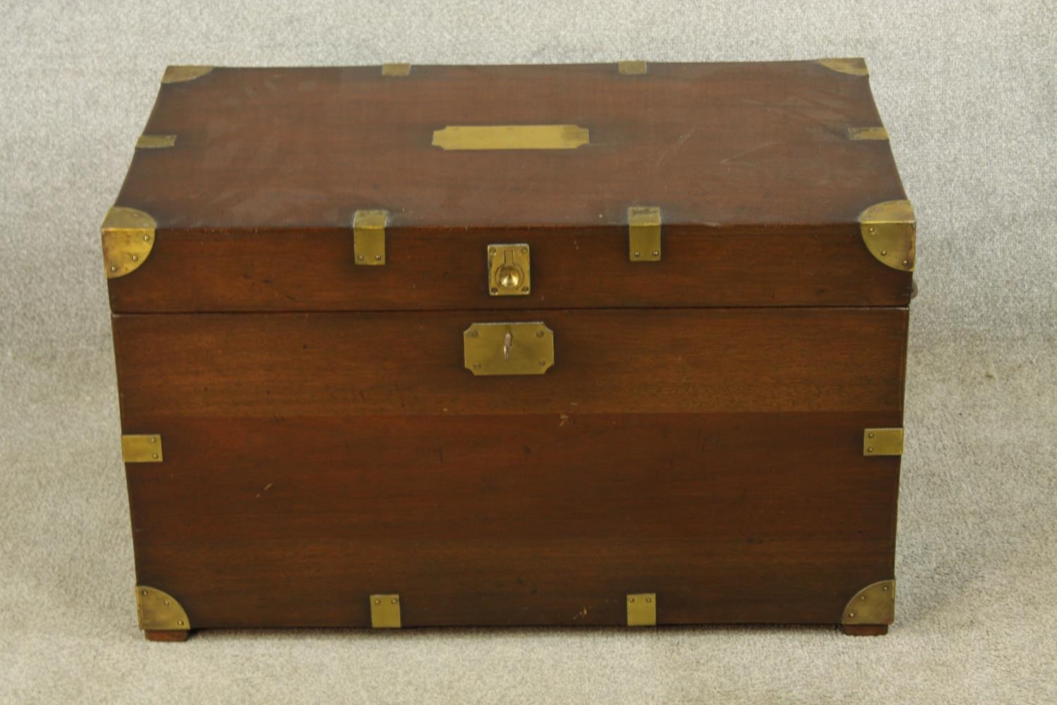 A 20th century stained hardwood and brass mounted campaign style twin handled blanket box. H.46 W.76