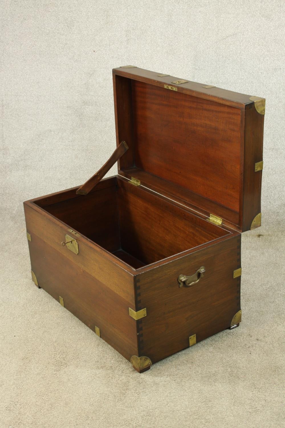 A 20th century stained hardwood and brass mounted campaign style twin handled blanket box. H.46 W.76 - Image 4 of 9