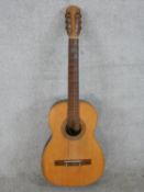 A 20th century Tatay Spanish guitar, impressed marks to neck, with carrying case. H.104 W.42 D.14cm.
