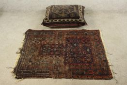 A 19th century blue ground Persian woollen prayer mat together with a Persian blue ground carpet