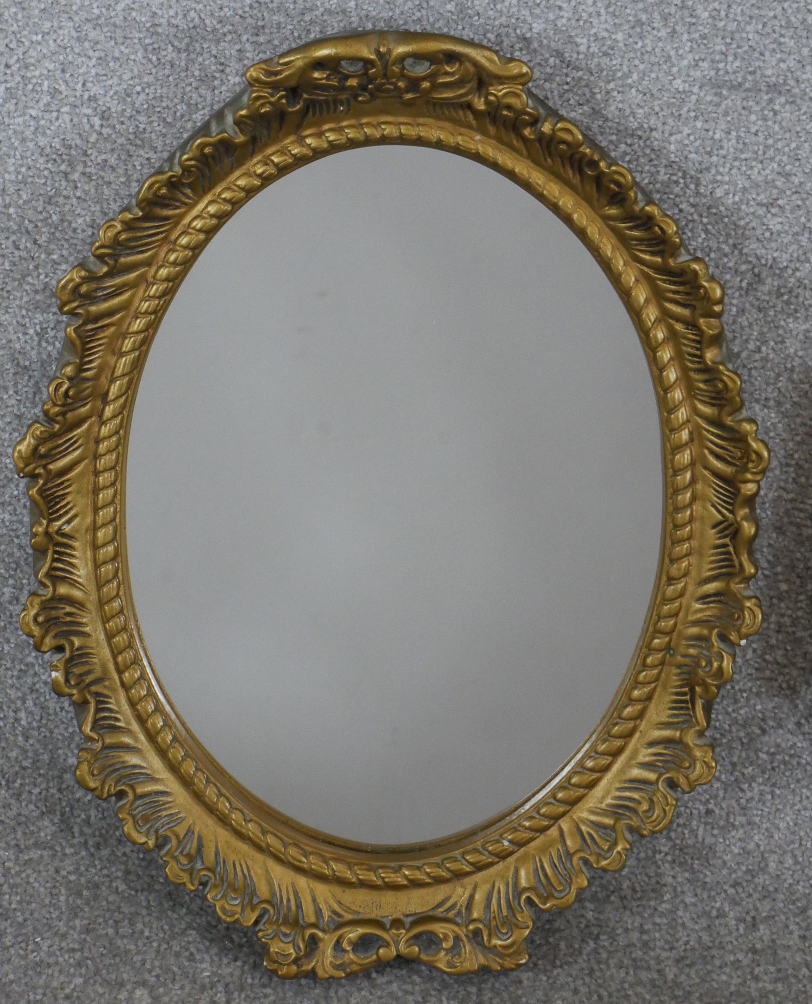 A contemporary octagonal shaped gilt framed wall mirror, together with an oval gilt framed wall - Image 2 of 4