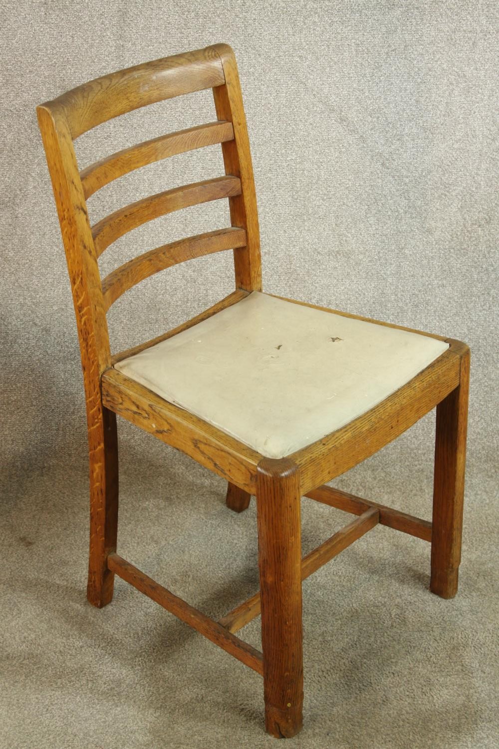A pair of early 20th century oak framed ladder back chairs, raised on carved supports with drop in - Image 4 of 8