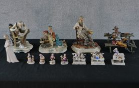 Twelve 19th century and later porcelain to include three Fairings, Capo di Monte style figures and a