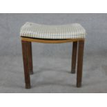 An Art Deco limed oak George VI Coronation stool, with inverted upholstered seat raised on square