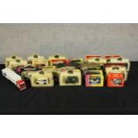 Assortment of boxed Lledo and Matchbox scale model vans. Collection of toy cars. H.7 W.25 D.5cm. (