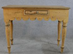 An early 20th century painted pine single drawer sidetable raised on turned supports. H.74 W.98 D.