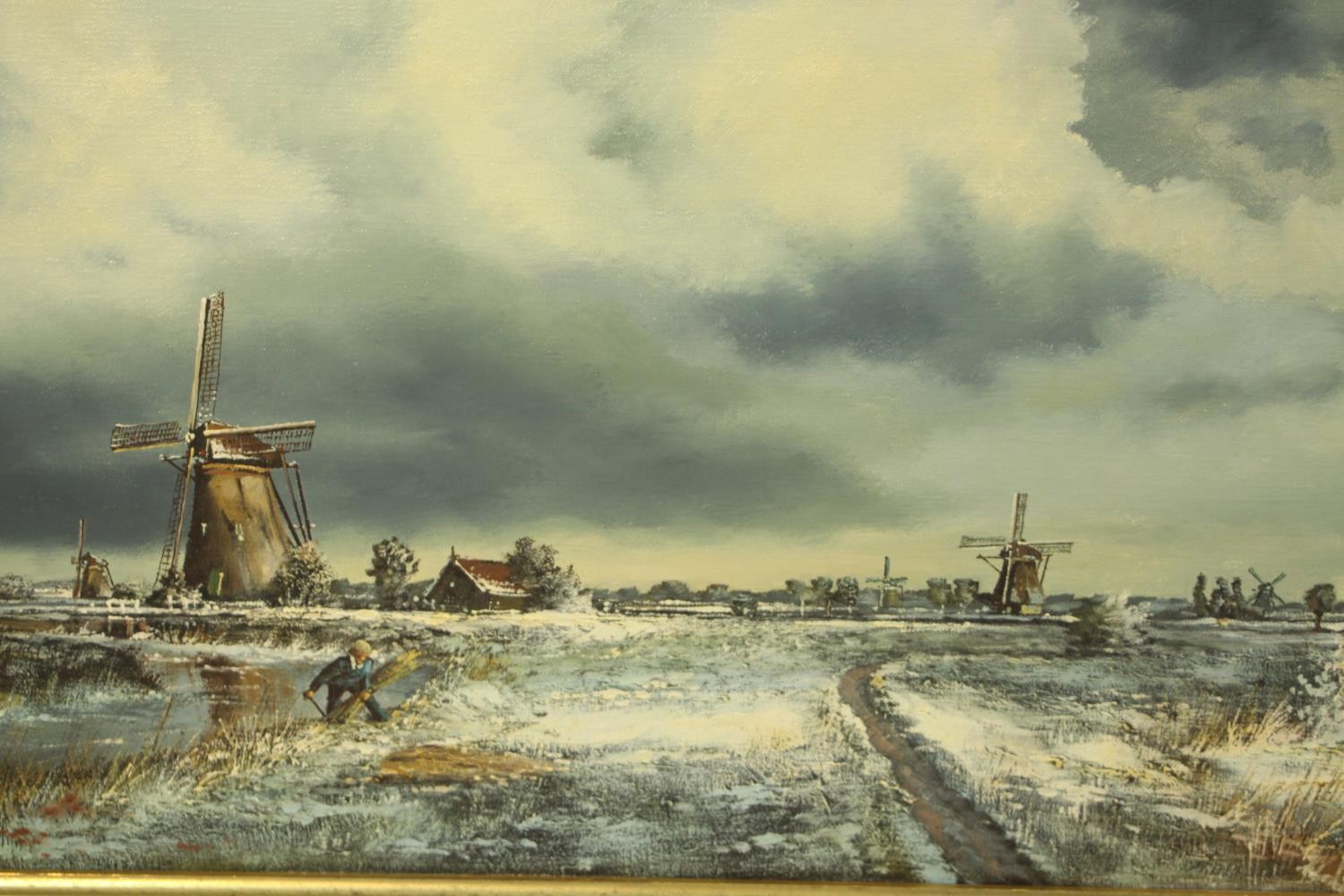 Kosten (20th century), snow covered windmills, oil on canvas, signed and framed. H.55 W.155cm.