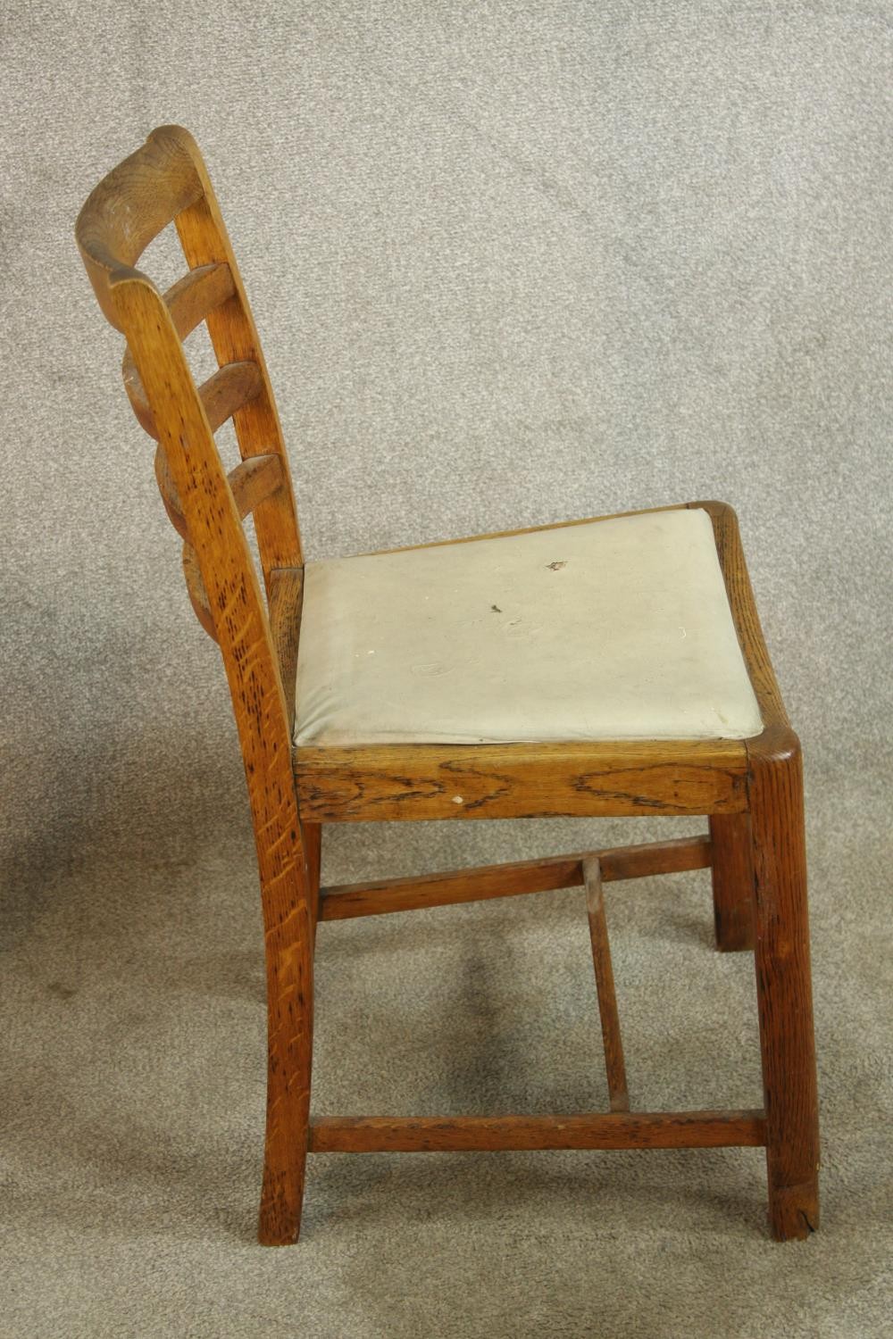 A pair of early 20th century oak framed ladder back chairs, raised on carved supports with drop in - Image 5 of 8