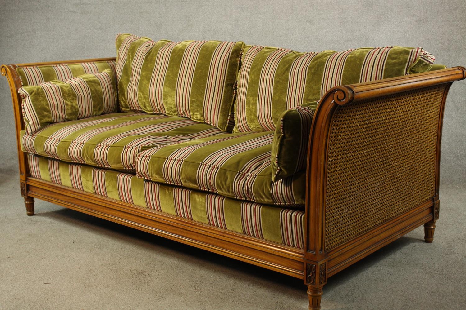 An early 20th century bergère and beech scroll arm two seater settee raised on fluted tapering - Image 3 of 8