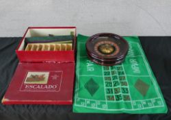A 20th century boxed Escalado game, complete with mat and accessories, together with a small