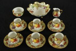 An early 20th century German porcelain part coffee set, comprising of cups, saucers, milk jug, bowls