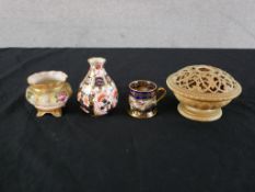 Four pieces of English porcelain comprising of a Royal Crown Derby Imari porcelain miniature vase, a