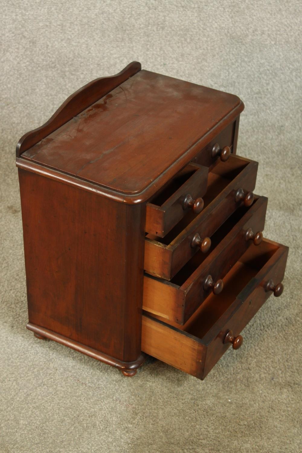 A 19th century mahogany apprentices chest of two short over three graduating drawers with turned - Image 4 of 5