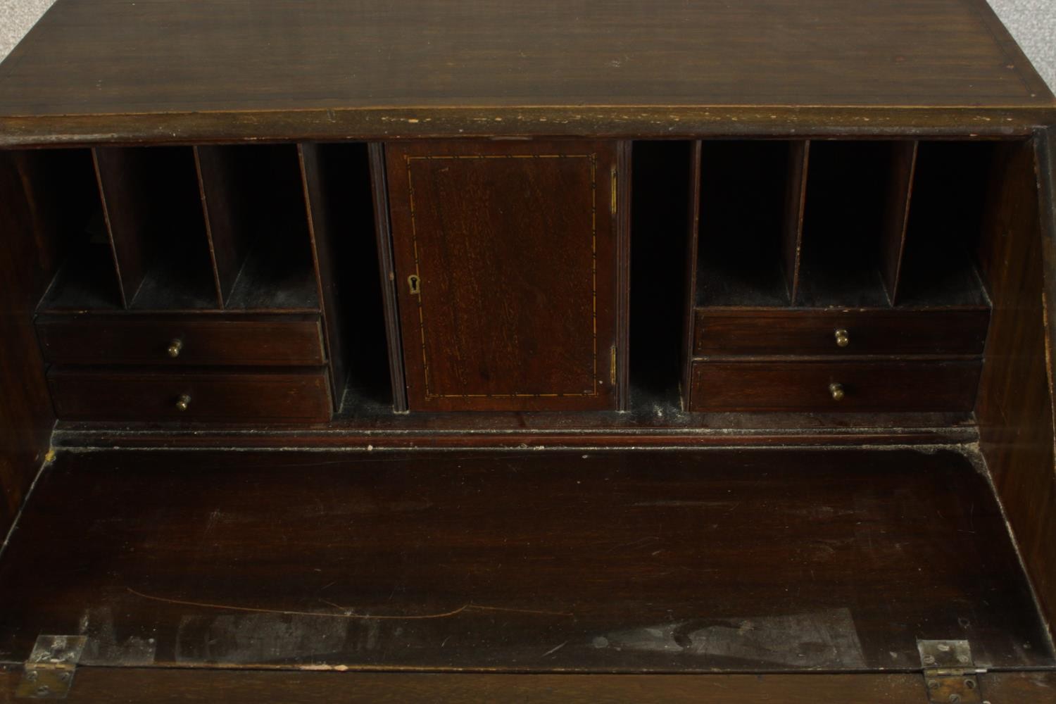 An early 20th century stained mahogany bureau, the fall front opening to reveal fitted interior, - Image 4 of 10