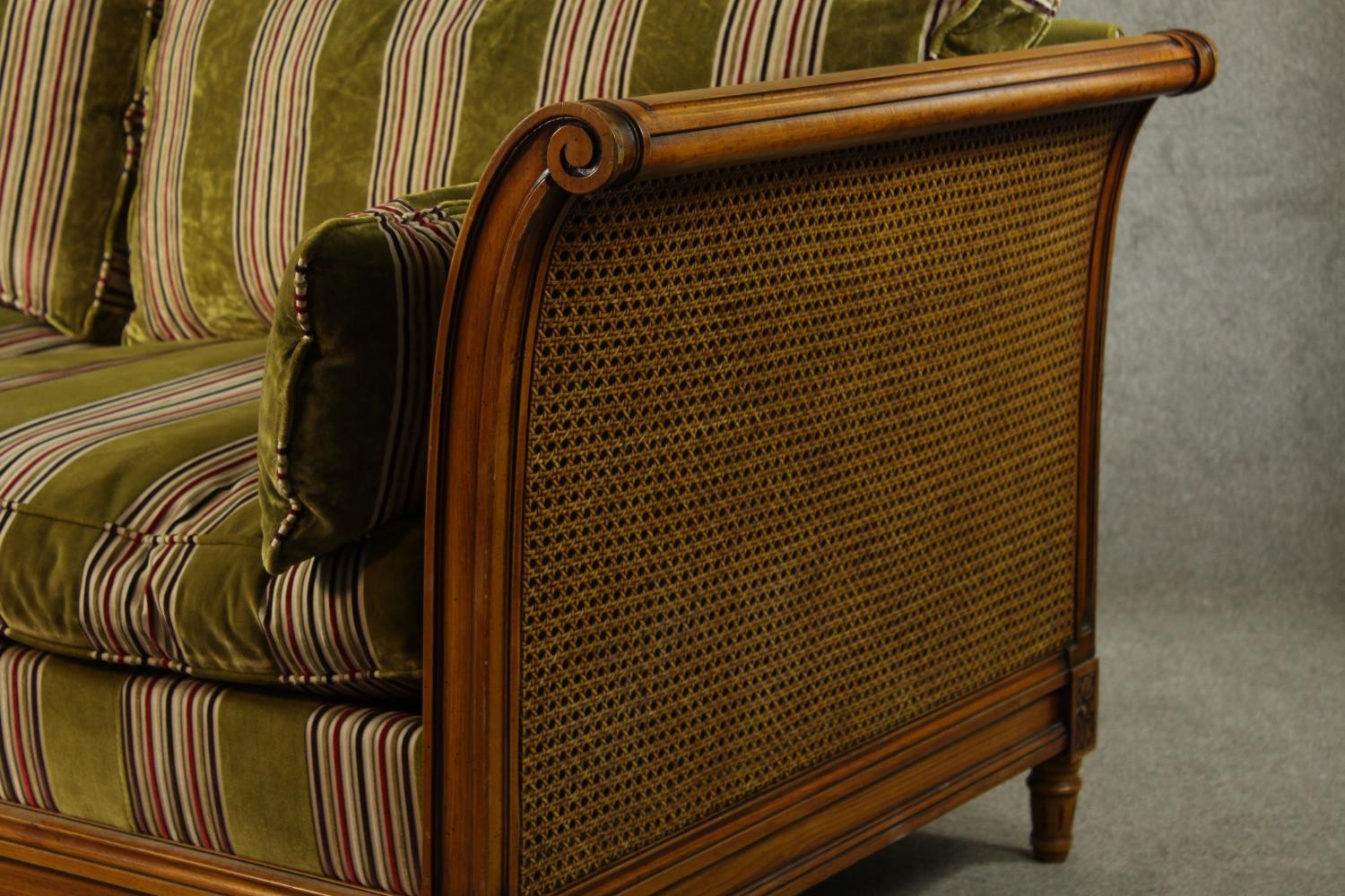 An early 20th century bergère and beech scroll arm two seater settee raised on fluted tapering - Image 7 of 8