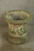A 20th century stone garden urn shaped planter and stand, with blind lattice work decoration. H.56