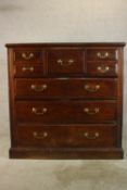 An Edwardian mahogany Scotch style chest of five short over three long graduating drawers with brass