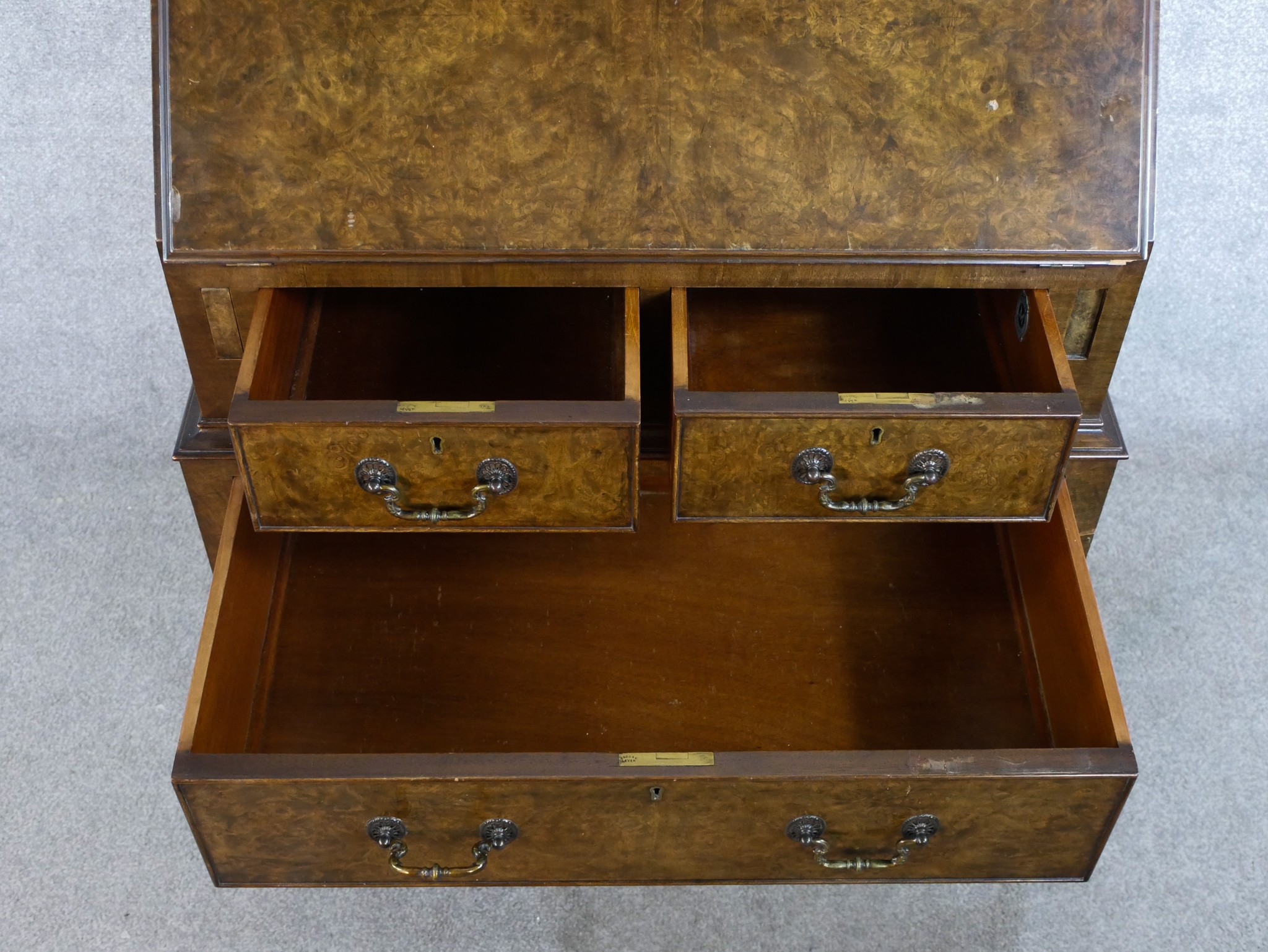 An early 20th century burr walnut fall front bureau, opening to reveal fitted interior with two over - Image 3 of 5