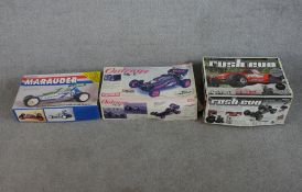 Three boxed scale model cars include Mardave Marauder remote control car, HPI - Racing Rush Evo