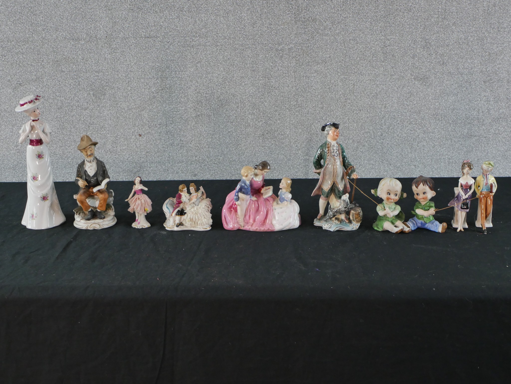 Ten assorted porcelain figures to include Royal Doulton Bedtime Story HN2059, a German porcelain