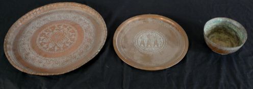 Two 20th century Indian engraved brass circular gallery trays, together with an engraved brass