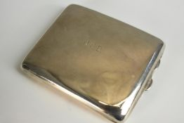 A George V hallmarked silver cigarette case, Birmingham 1918, bearing engraved initials. L.10cm.