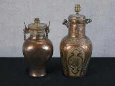 Two Northern Iraqi copper oil jars coverted to electric table lamps. H:40 dia:18cm