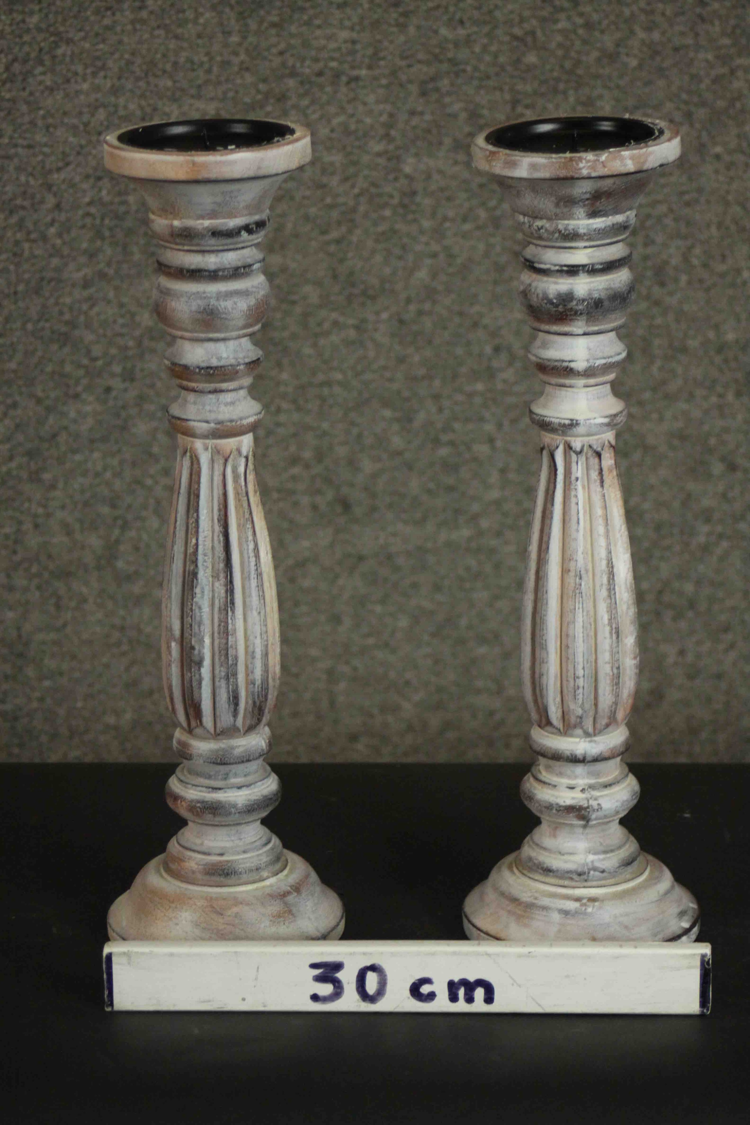 A pair of painted and distressed wood pricket candlesticks, turned and reeded. H.44 Dia.13cm. - Image 2 of 4