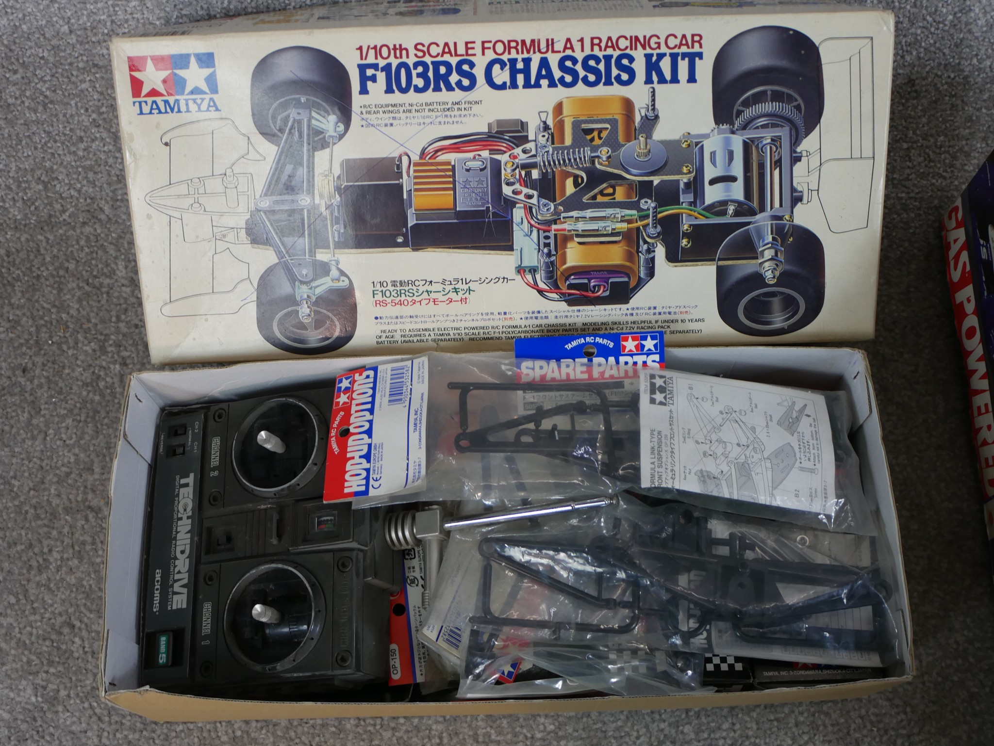 Three boxed scale model cars to include Tamiya 1:10 F103RS Chassis kit, Nissan 93 Cox racing car & - Image 4 of 7